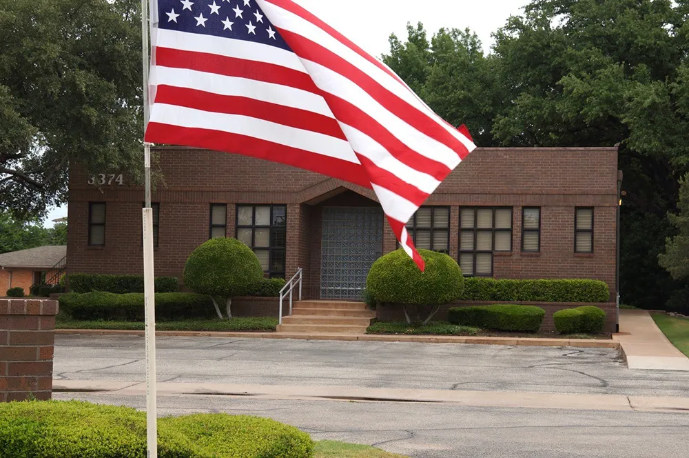 Glen Hall DDS building with flag